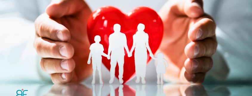 reviewing immigration health insurance documents for Hungary with a client in Budapest office — Immigration Health Insurance for Hungary.